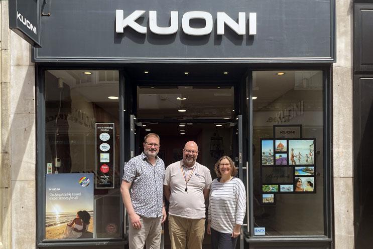 Team members from Play to the Crowd and Kuoni standing outside Kuoni's Winchester store